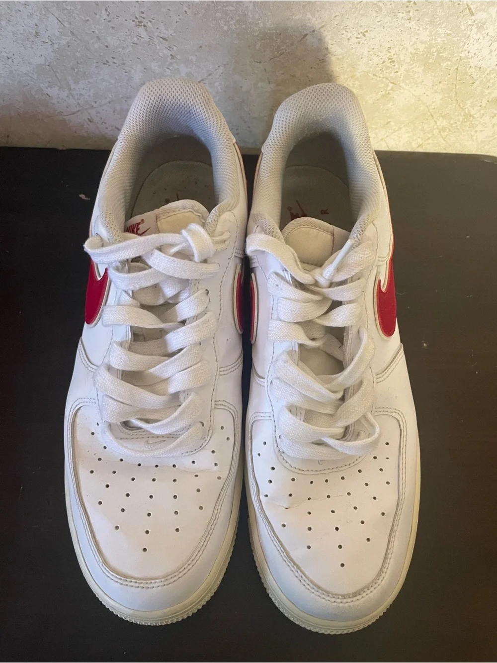 Nike Air Force 1 All-White Low Top Sneakers with Red Swoosh